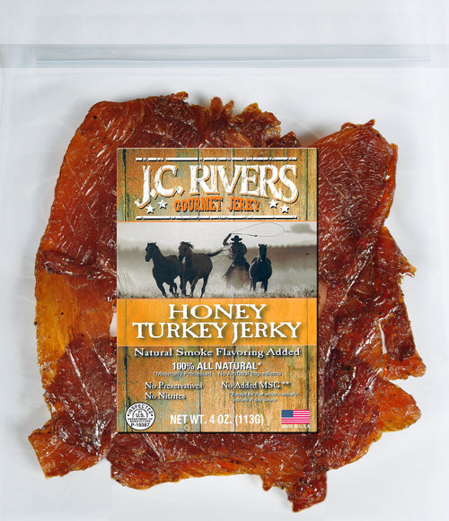 Packaged honey turkey jerky with visible product branding and a picture of horses.